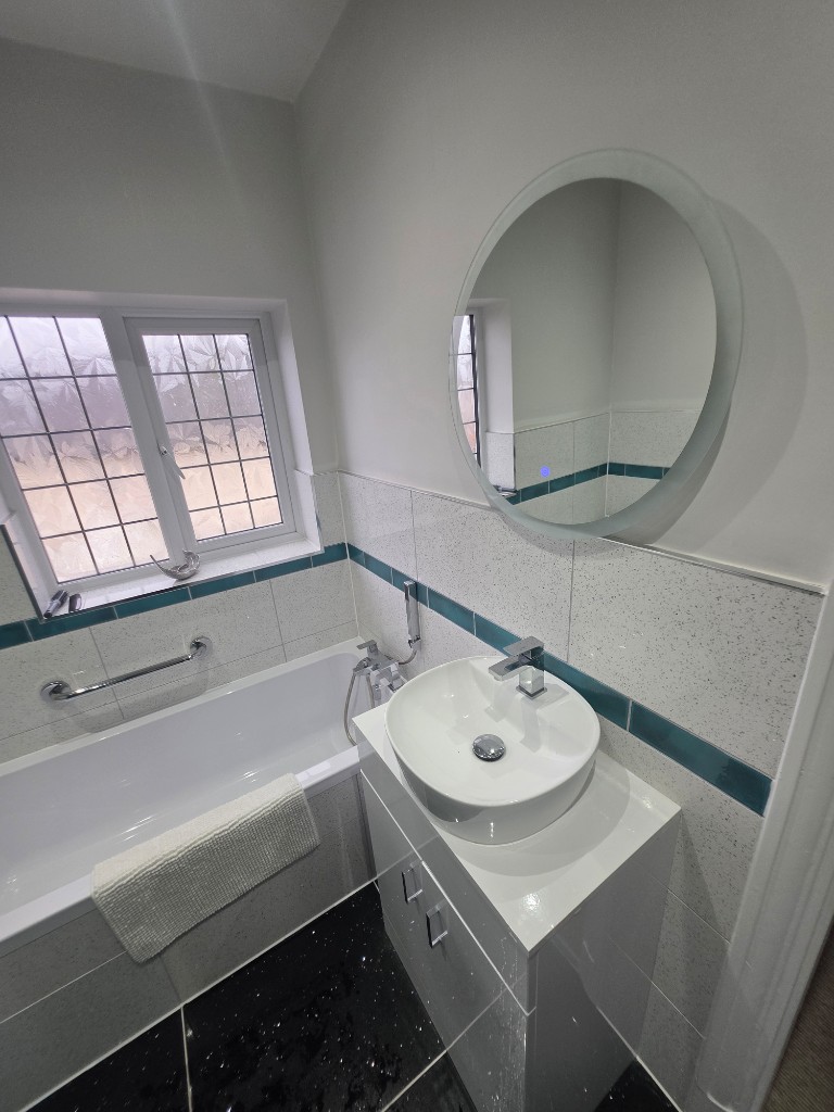 Vanity, vessel basin and teal accent band