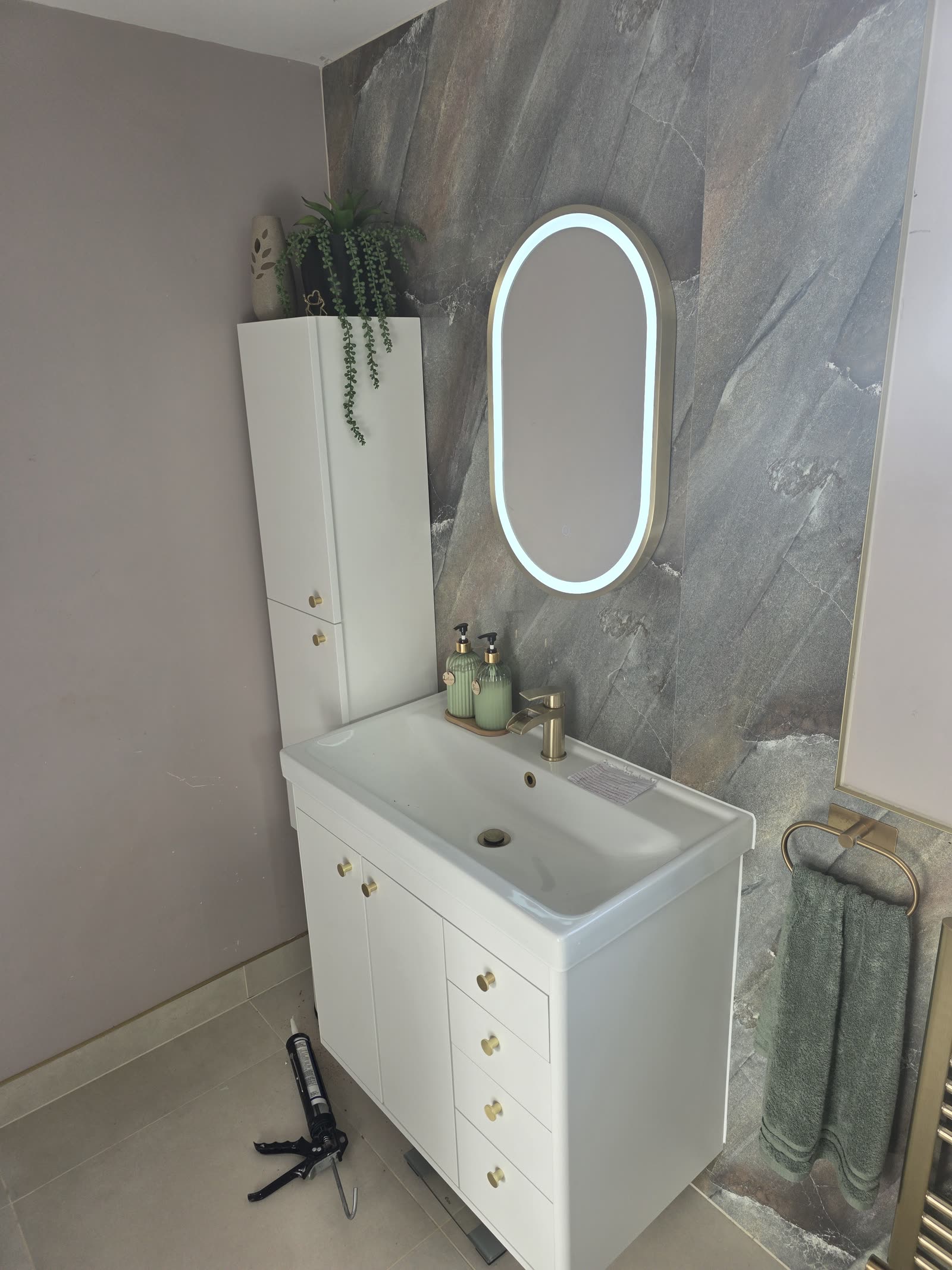 Finished Ighten Hill bathroom — tiled floor and panelled walls